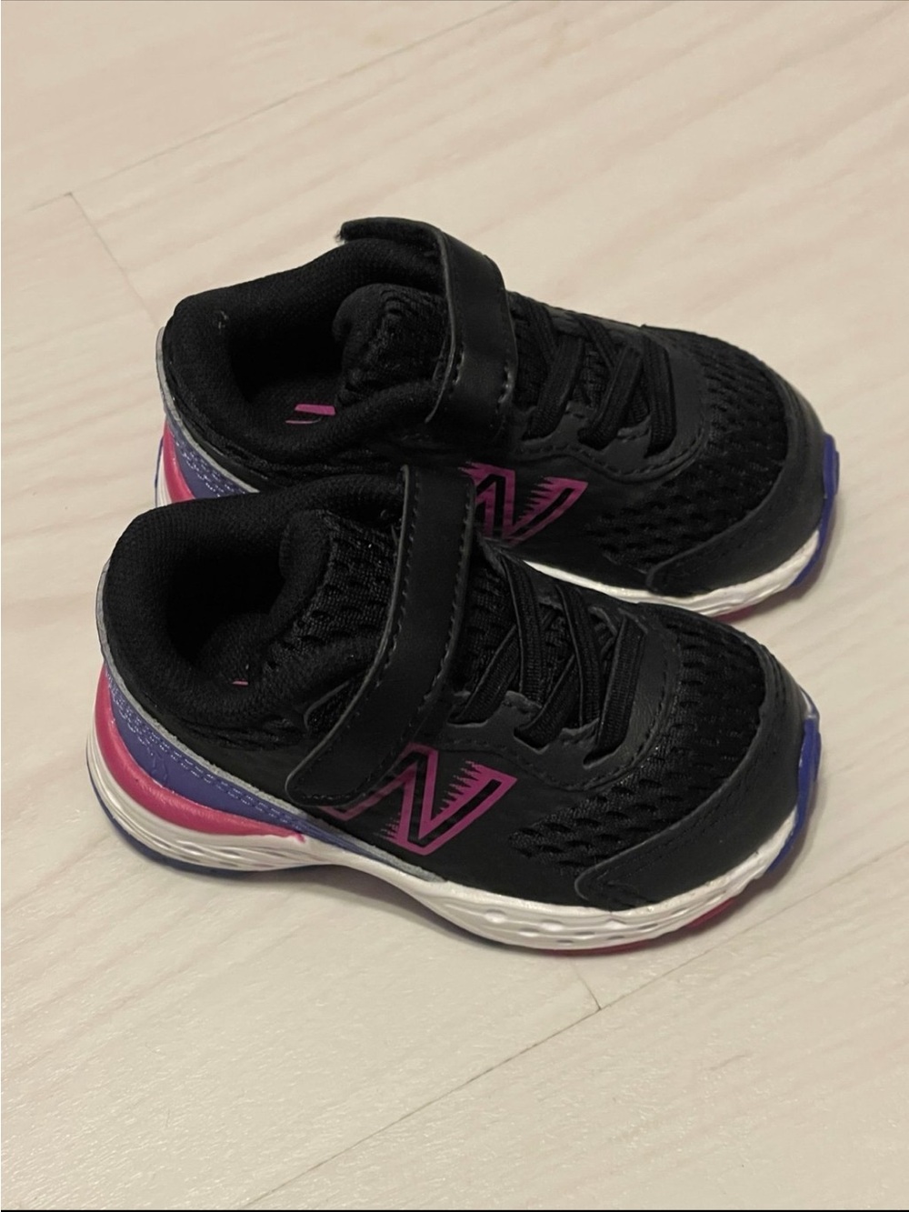 New Balance Kids Black Sneaker with Pink & Purple Highlights